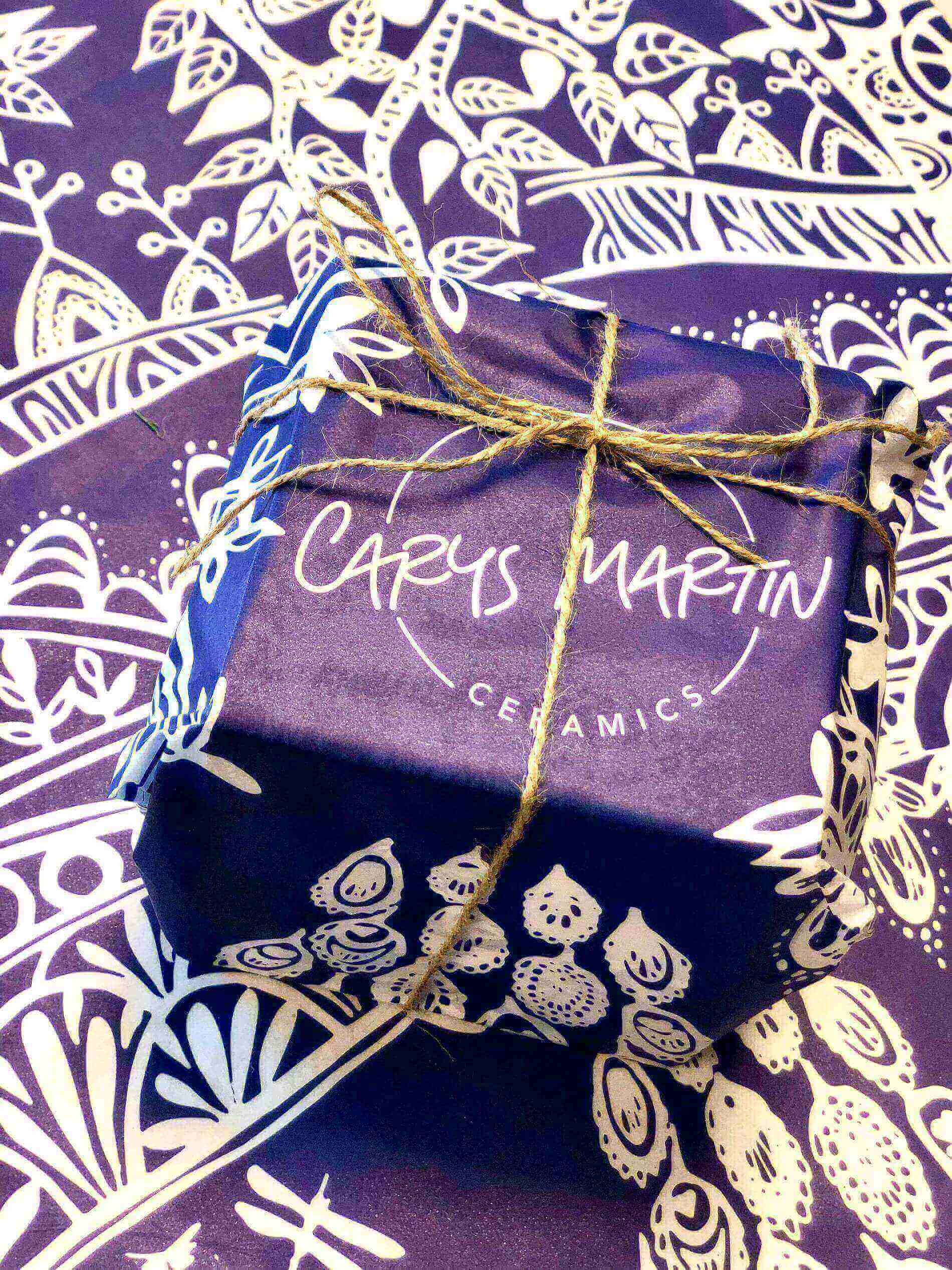 Package wrapped up in Carys Martin Ceramics branded tissue paper