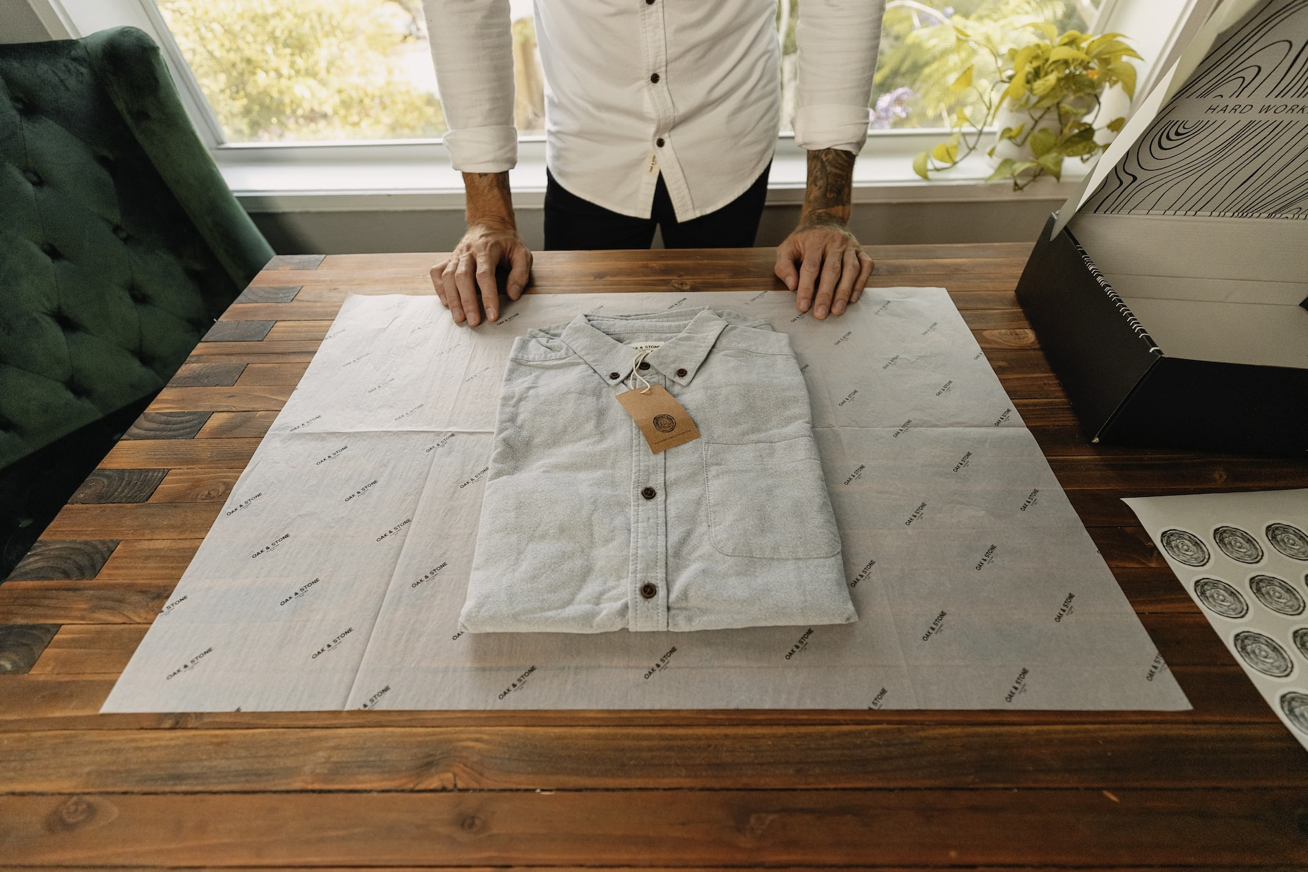 Oak & Stone shirt laid out on custom tissue paper