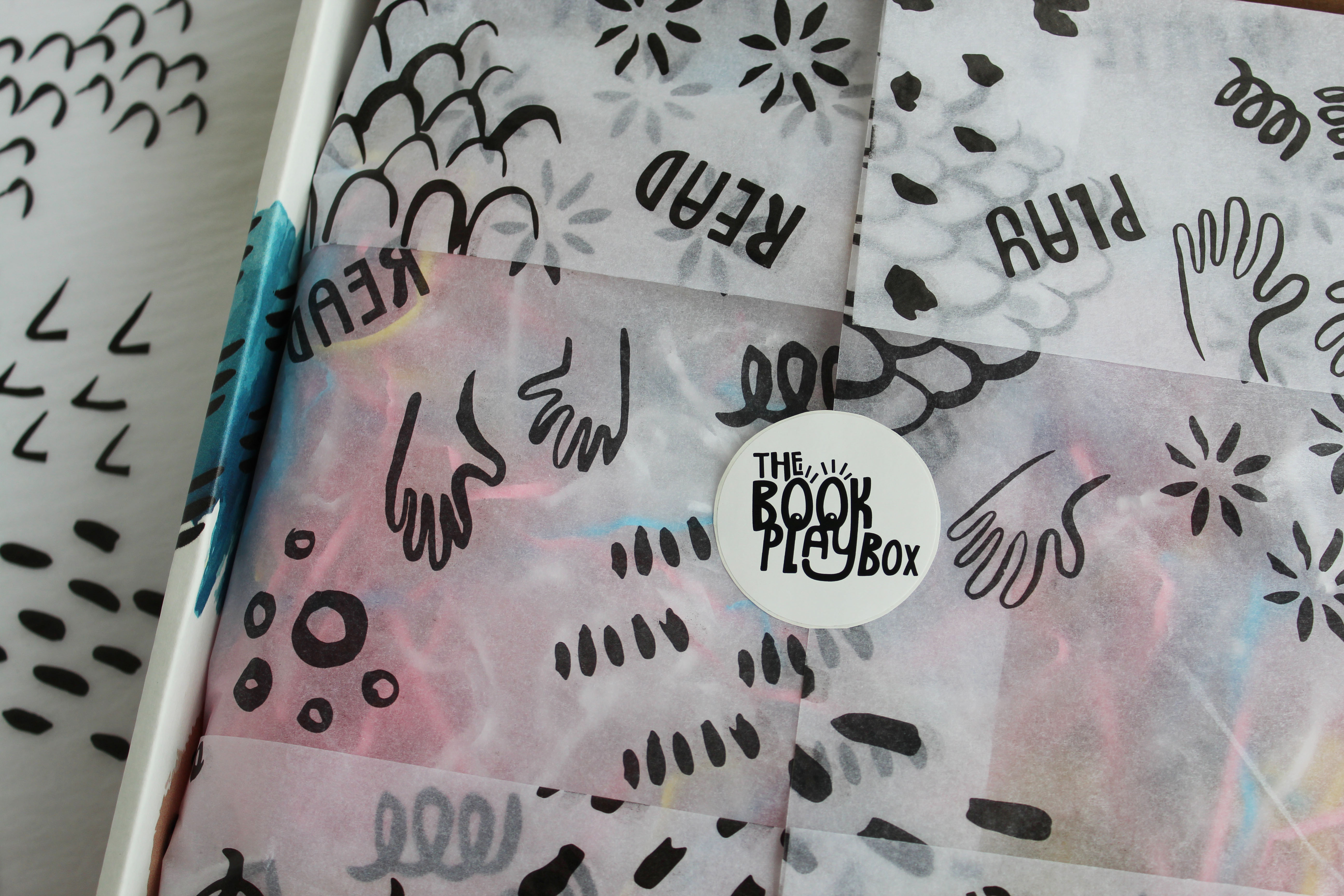 Close-up of The Book Playbox custom sticker